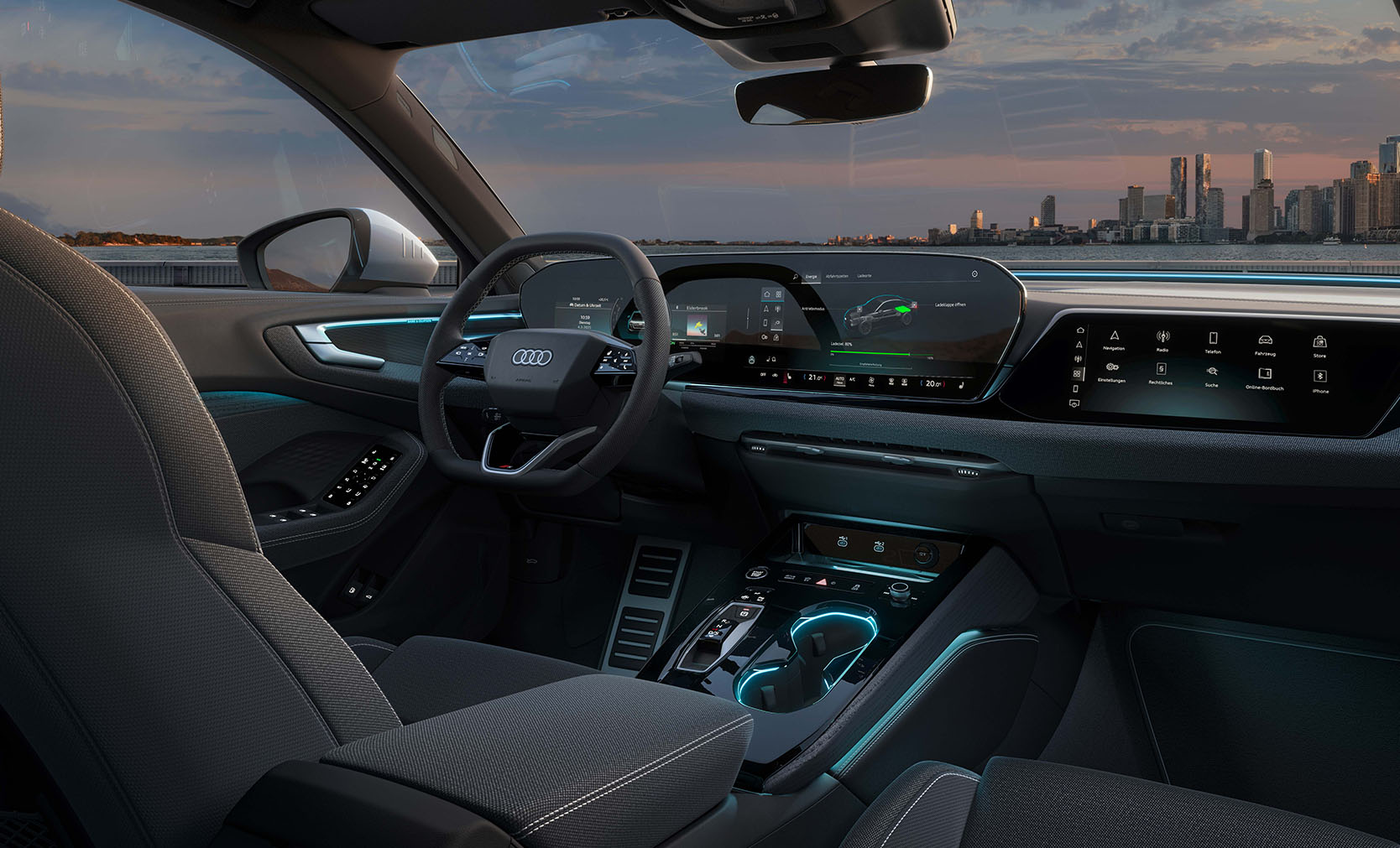 Innenraum des A5 Avant e-hybrid, mit dunklen sitzen und Ambiente licht