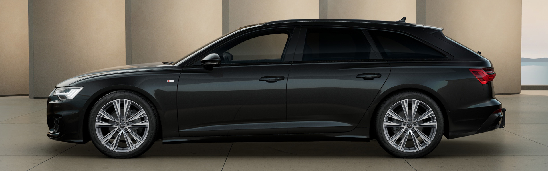 schwarzer Audi A6 Avant seitlich
