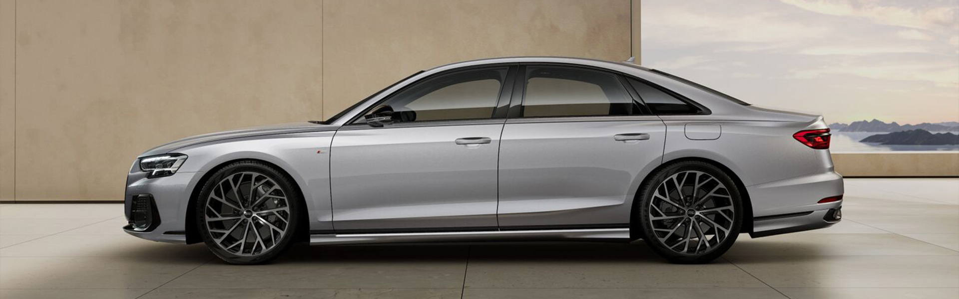 Audi A8 TFSI e in Florettsilber Metallic von der Seite. 