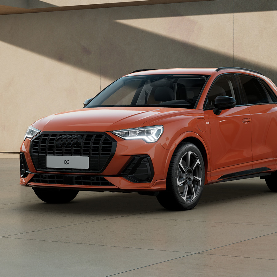 Audi Q3 TFSI e in Pulsorange seitliche Front 